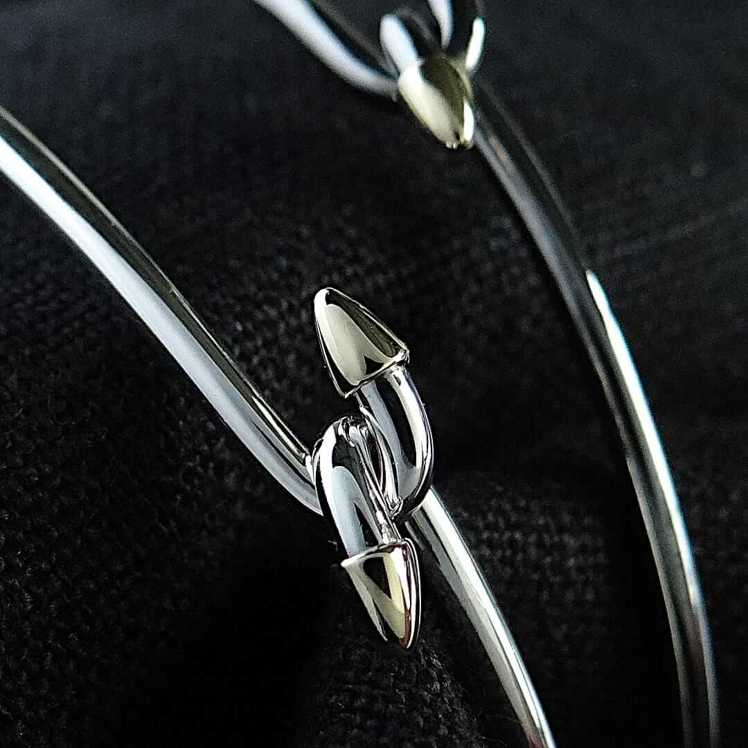 Sterling silver and 18ct bullet bangles