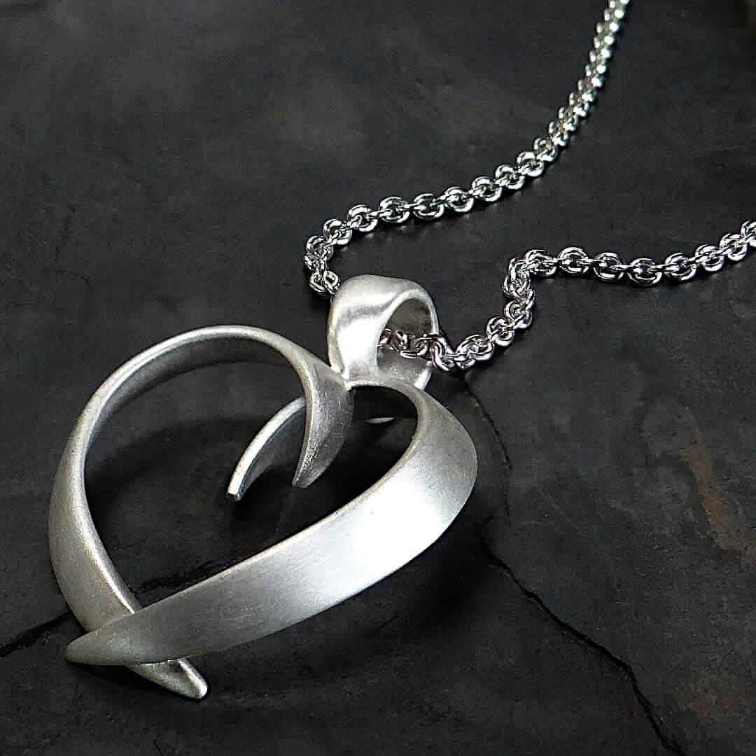 Sterling siver open heart mobius pendant