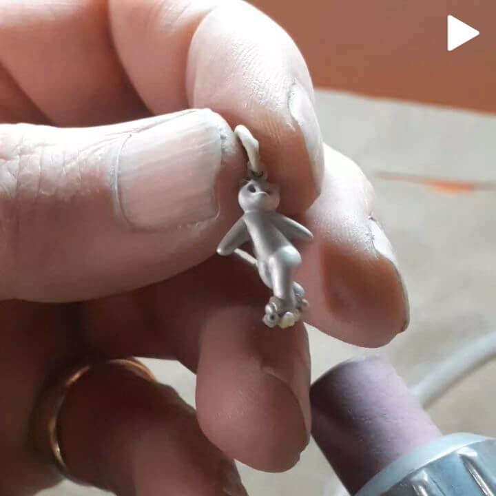 Sandblasting a teddy bear charm